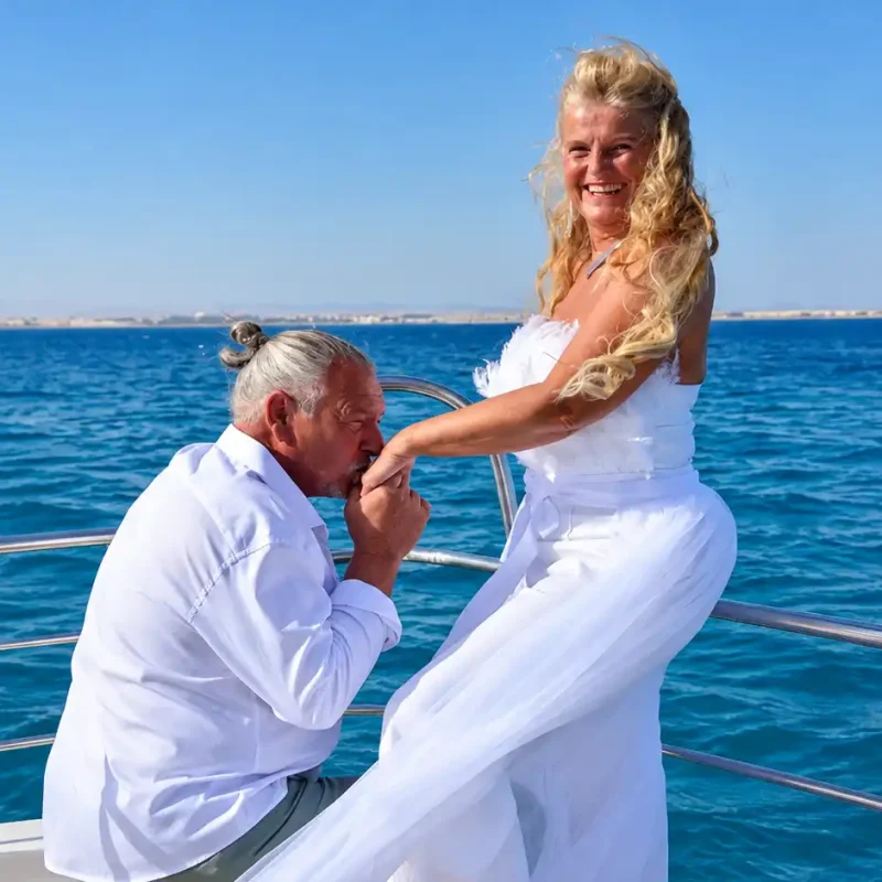 Romantic Boatside Hand Kiss